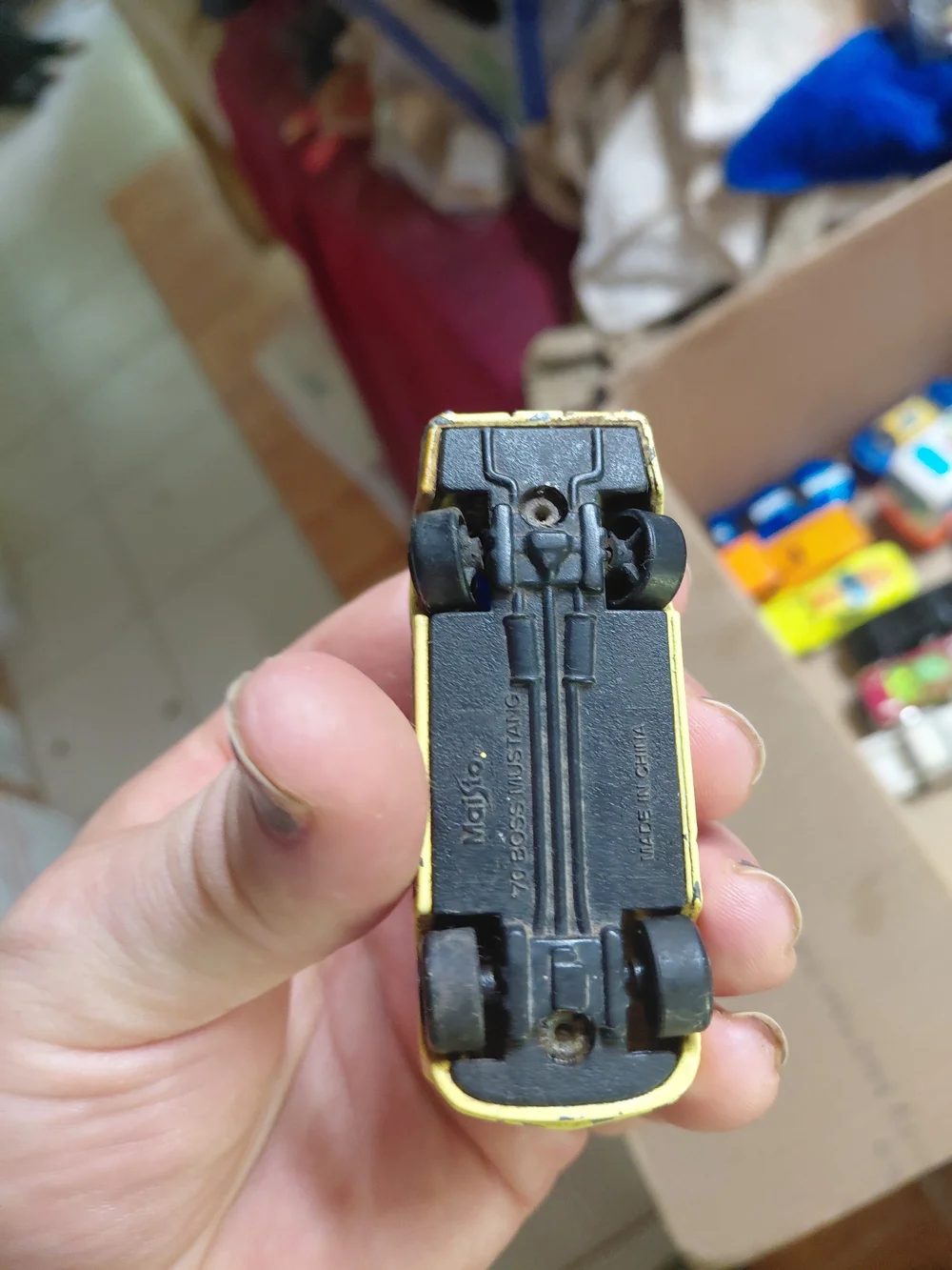 1:64 scale die-cast model of a 1970 Ford Mustang Boss 302,